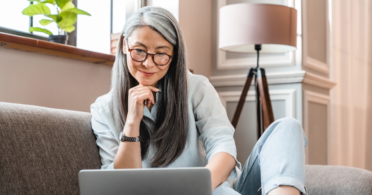 senior woman using laptop at home