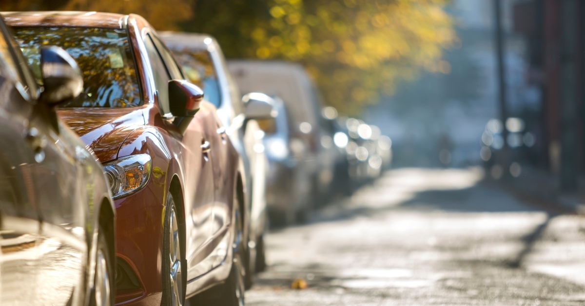 long row of different shiny cars