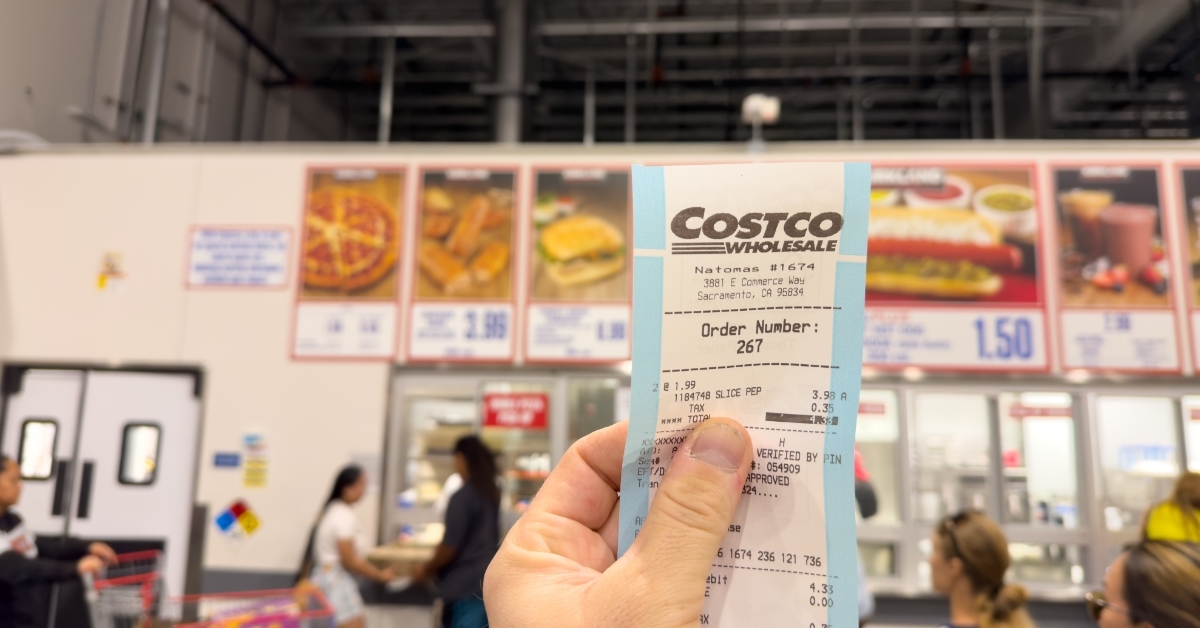 hand Holding receipt at costco food court