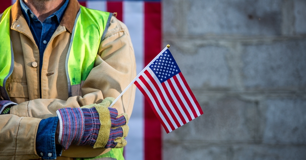 worker man and american flag