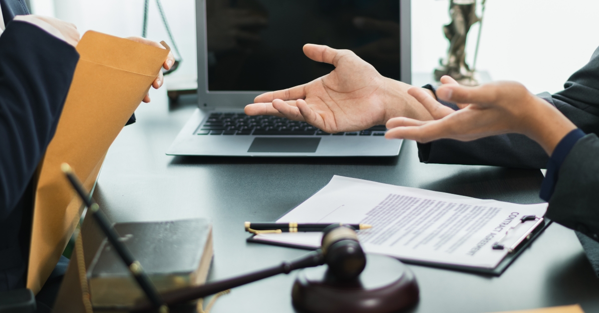 Client meets with a lawyer