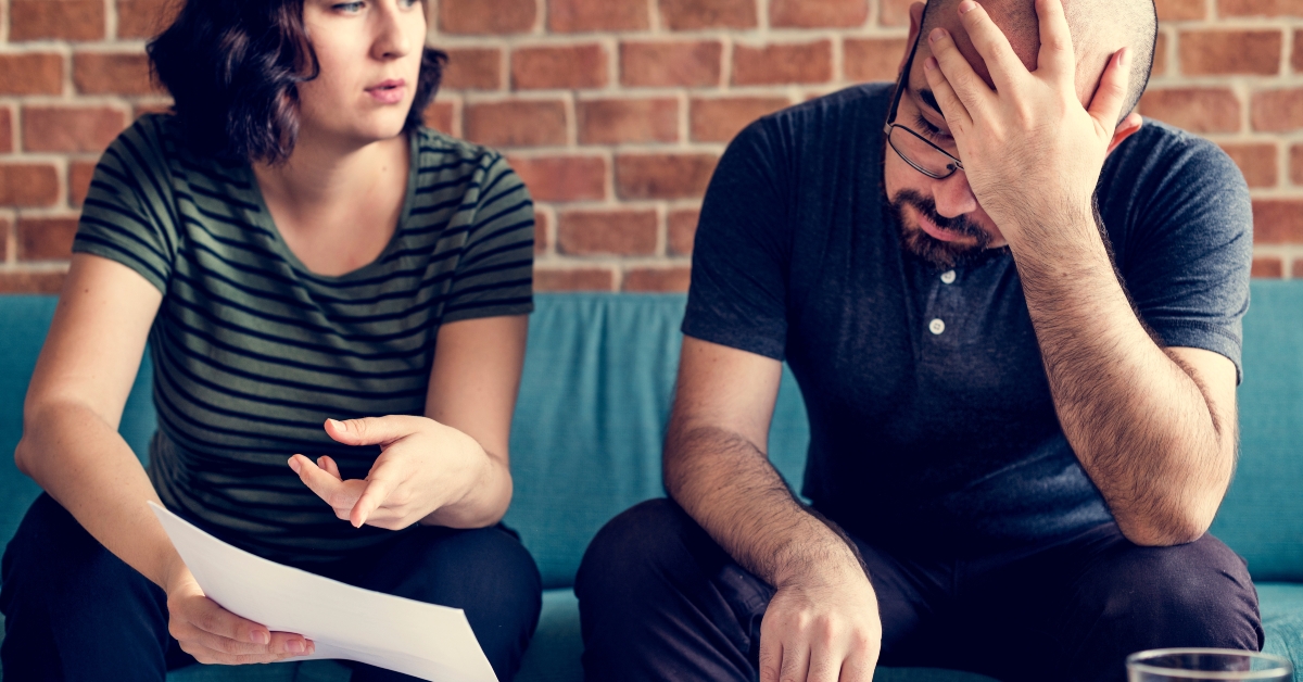 Couple managing the debt