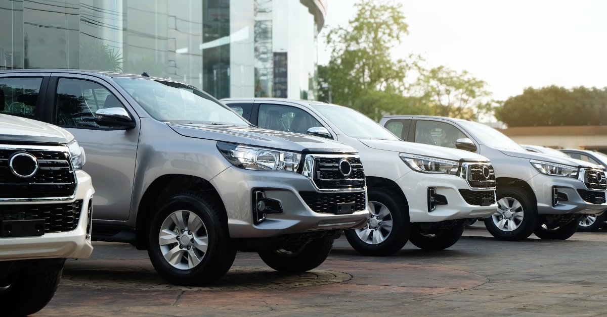row of new pickup trucks