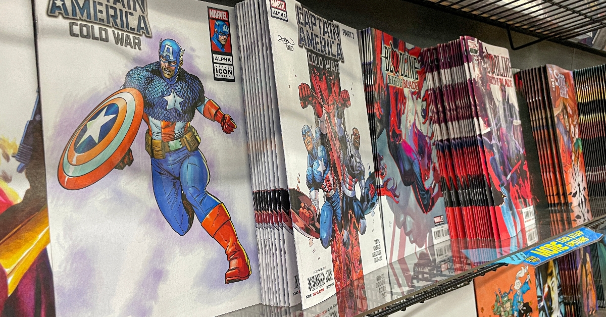 Captain America and other comic book titles on shelf