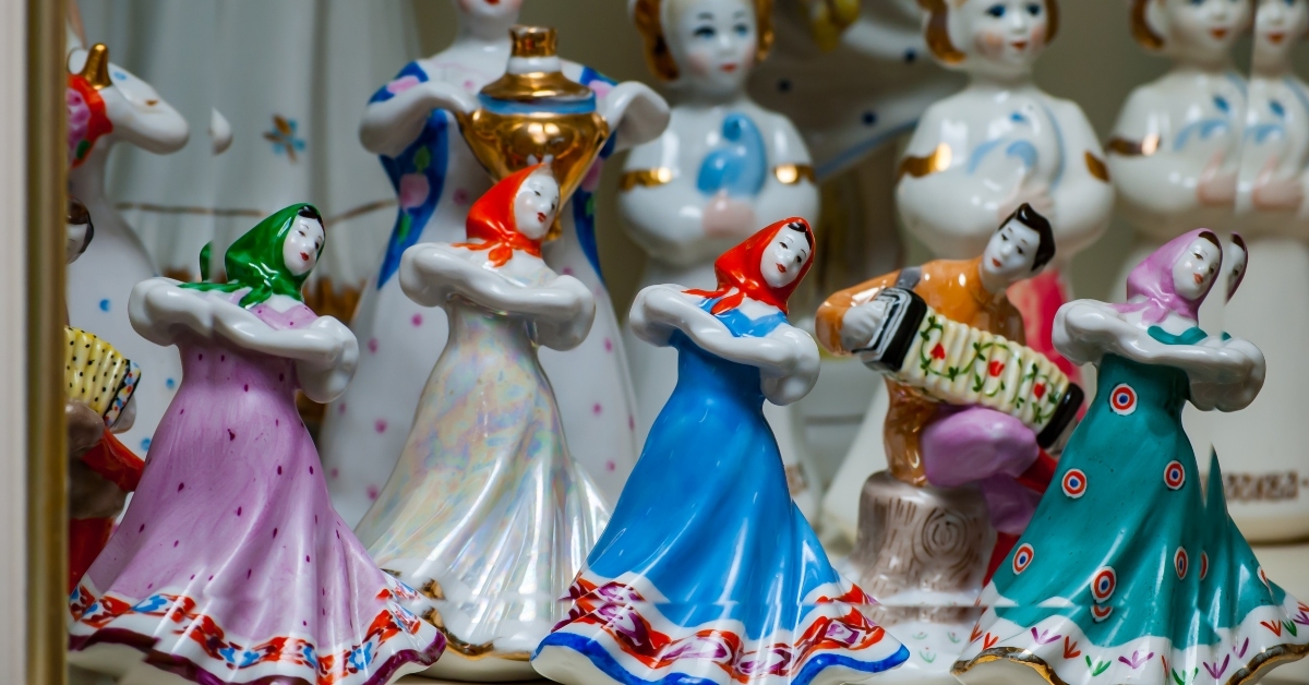 Porcelain figurine dancing dolls on a shelf