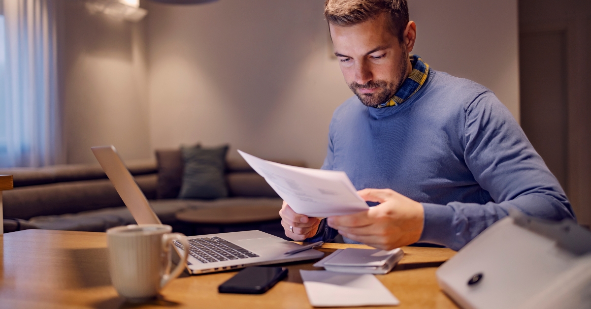 a casual businessman doing paperwork