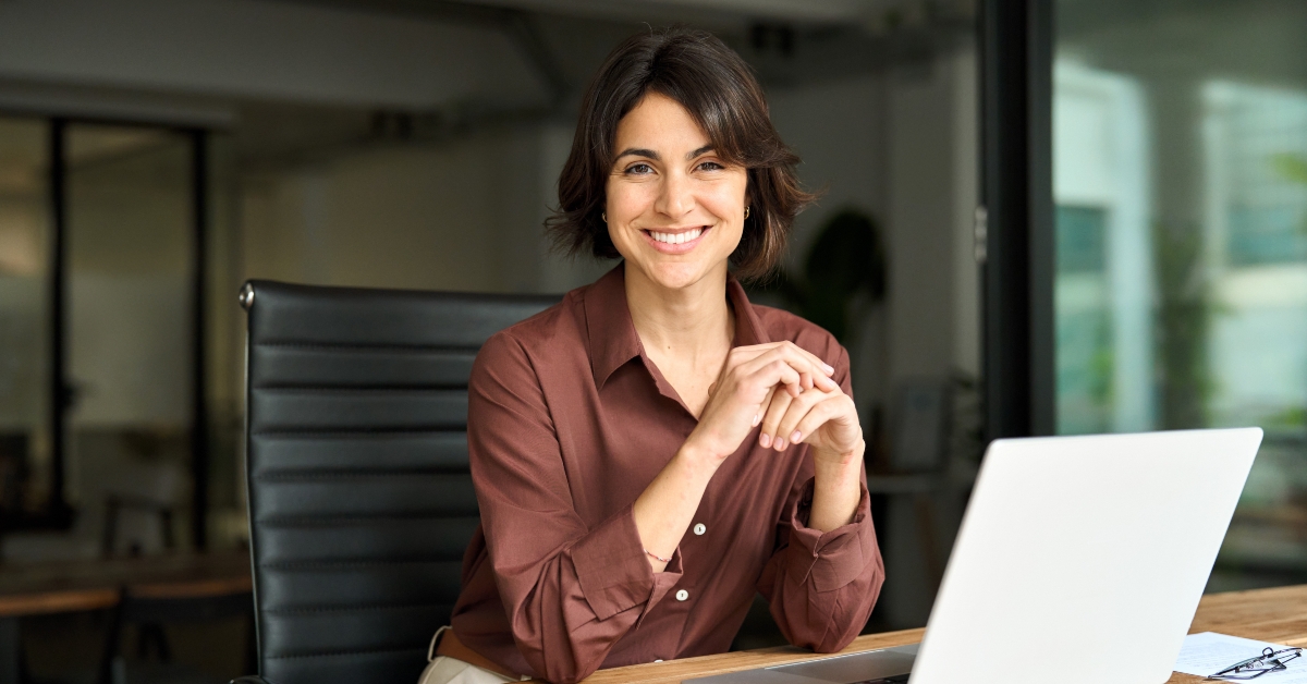 smiling hispanic young woman entrepreneur