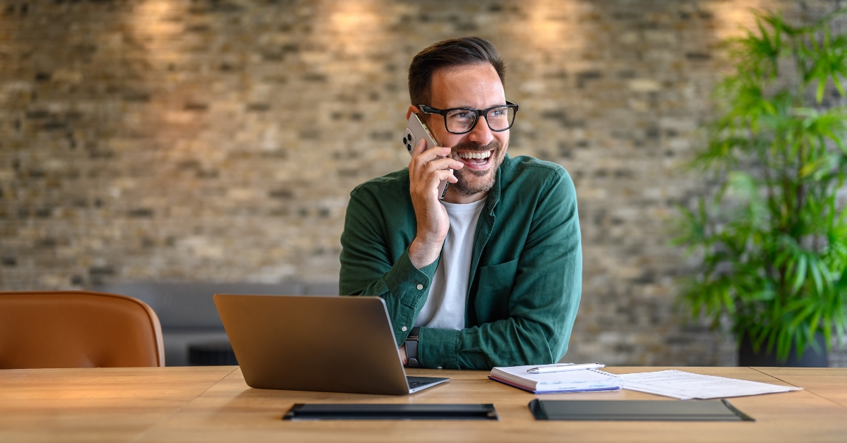 Happy financial advisor in glasses