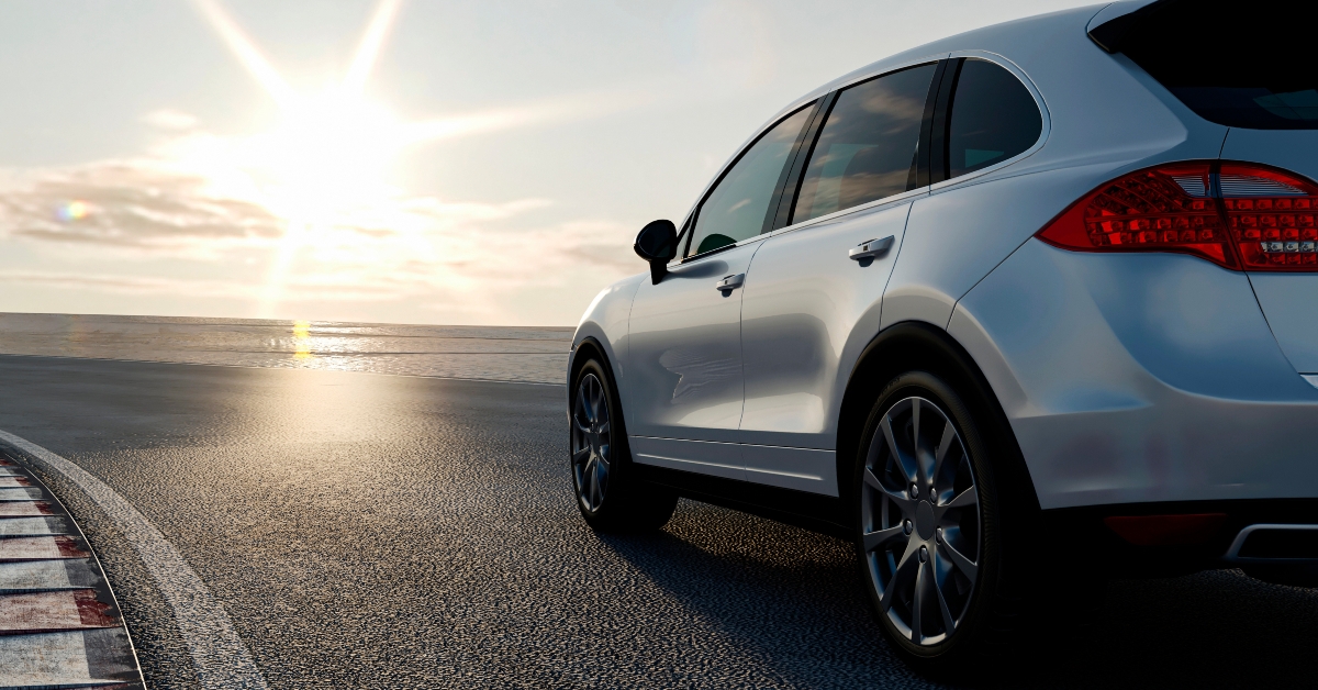 3d car sedan rides on the road