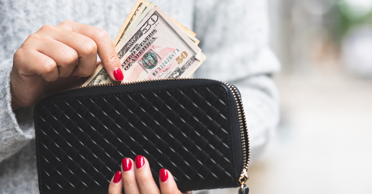 person holding a wallet