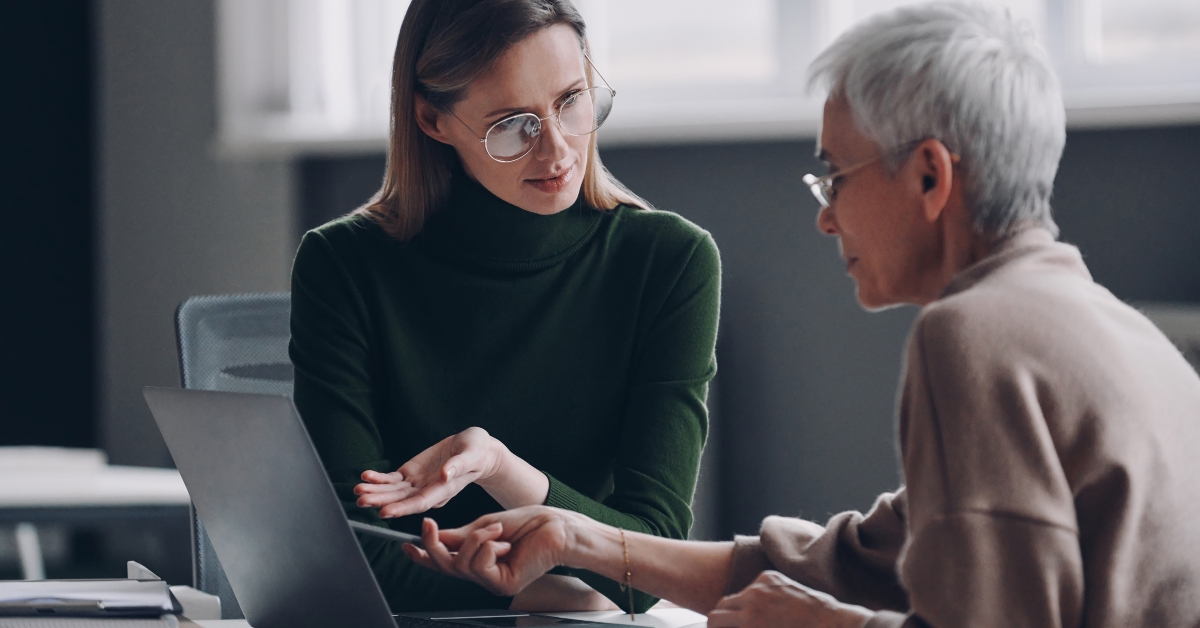 confident financial advisor pointing