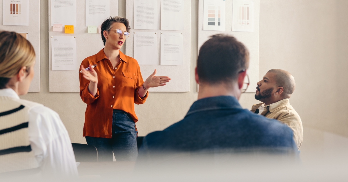 mature-businesswoman-pitching-ideas