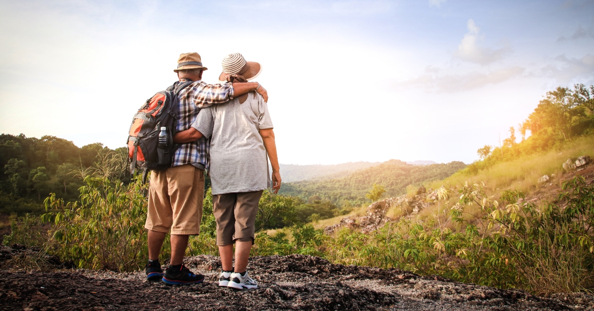 elderly couple hiking