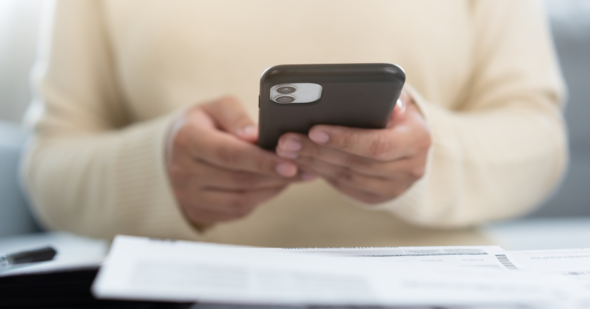 woman holding mobile phone 