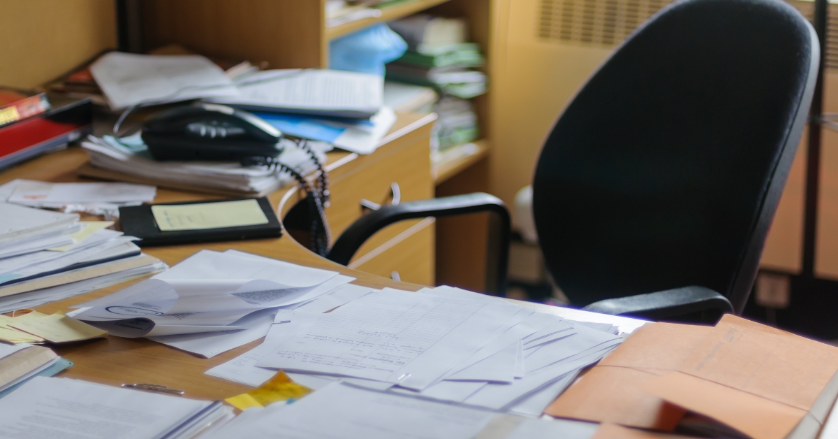lots of paper on a desk