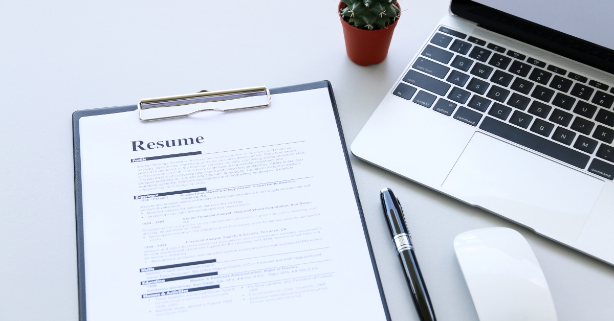 resume on wooden table