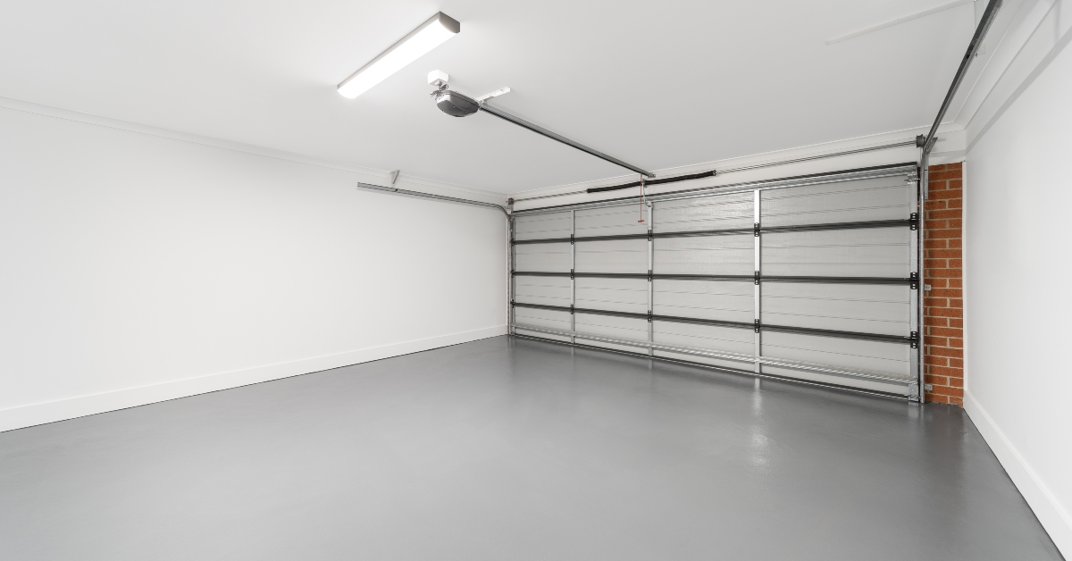 spacious garage interior with grey flooring