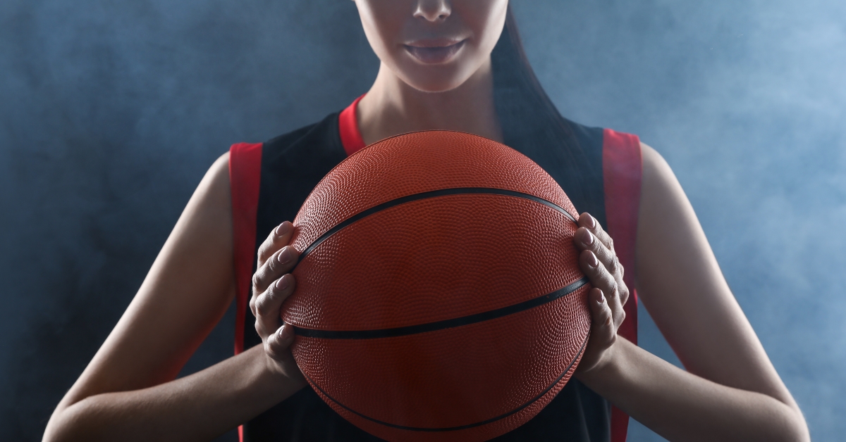 Basketball player holding a ball