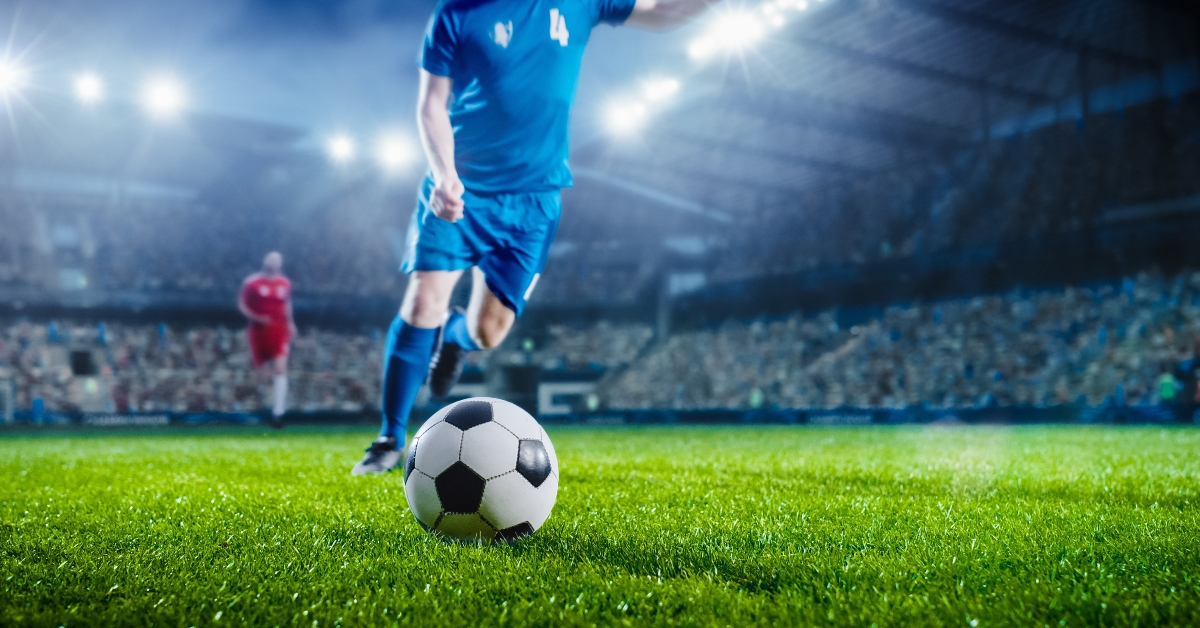 A person aiming a ball