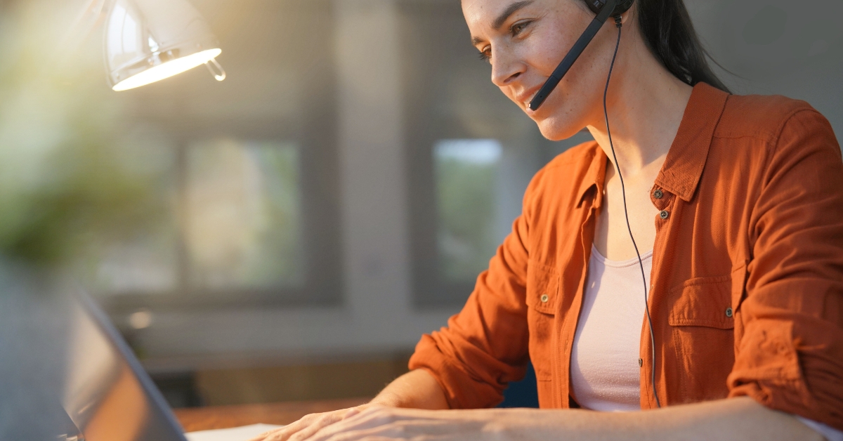 stunning brunette working on computer at home