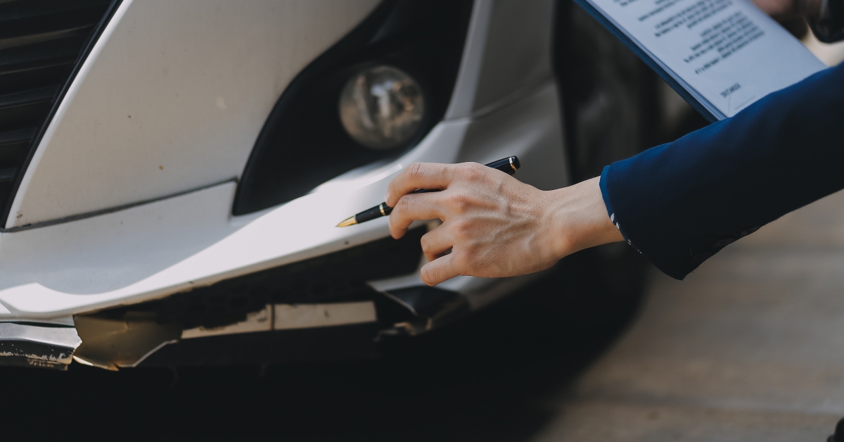 businesswoman is navigating car insurance options at her desk