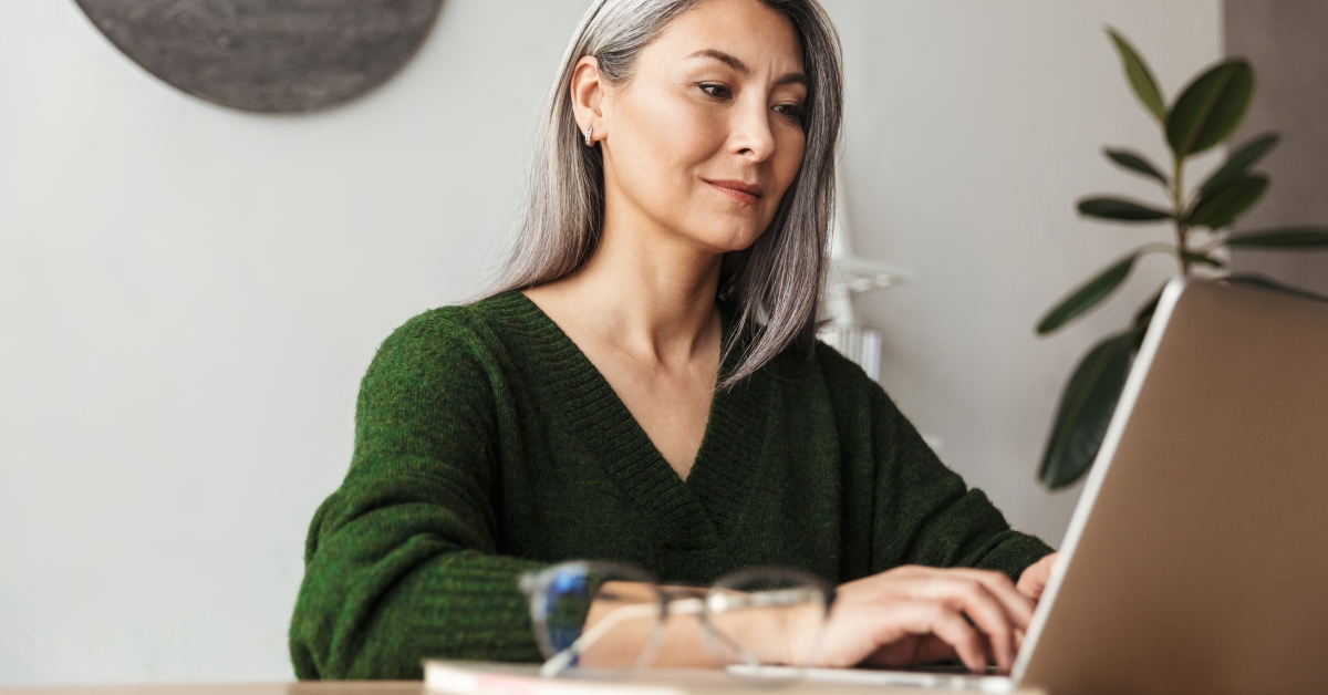 businesswoman typing on laptop 