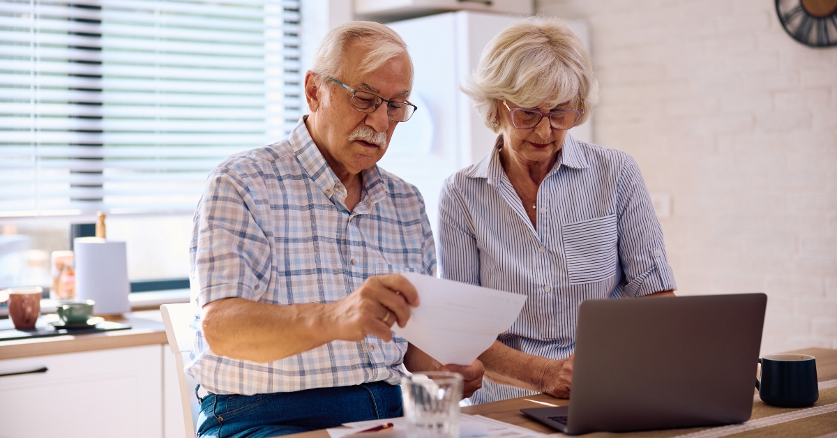 senior couple planning their household budget