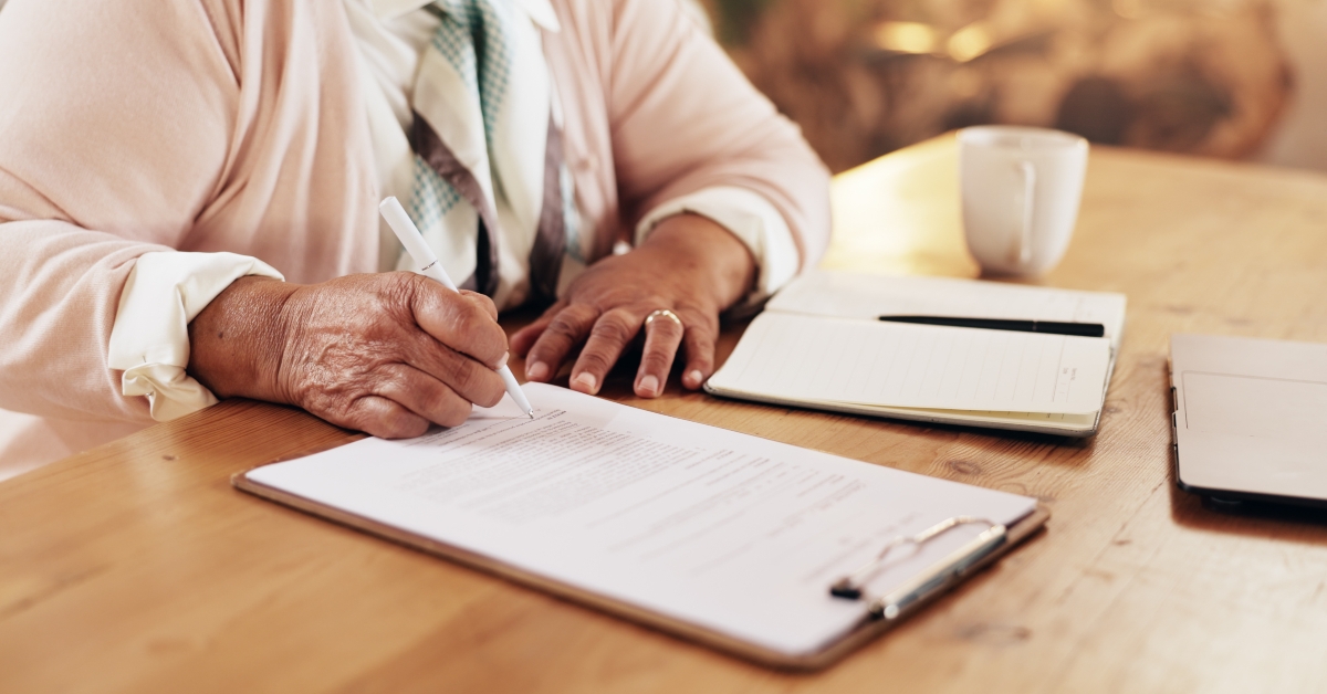  senior woman with application for retirement