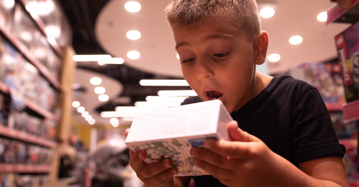 little boy in a toy store