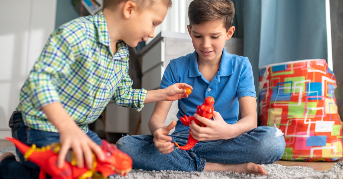 playing with rubber animal figures