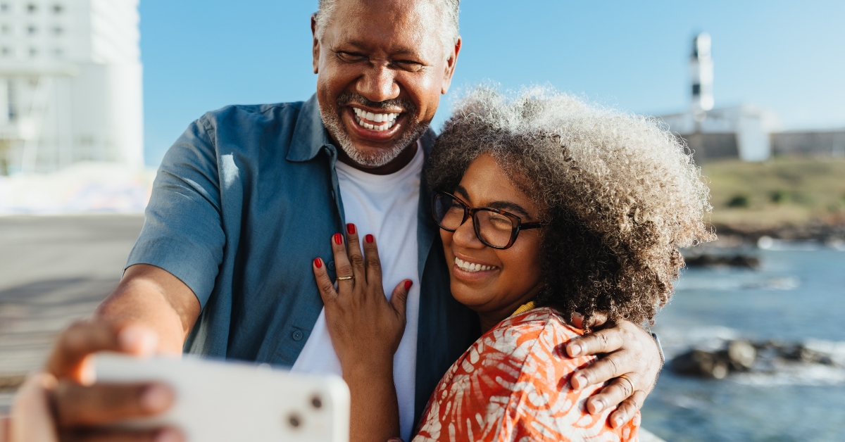 retired happy pair taking a selfie