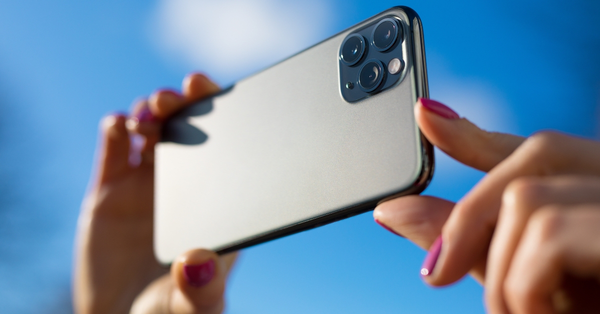 person holding modern smartphone