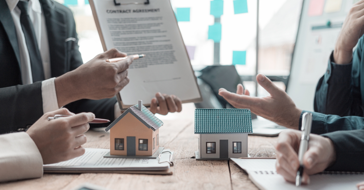 real estate agent shows a sample home