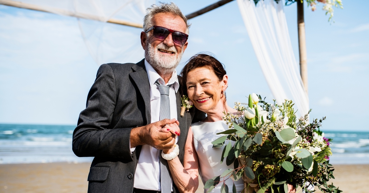 mature couple getting married at the beach