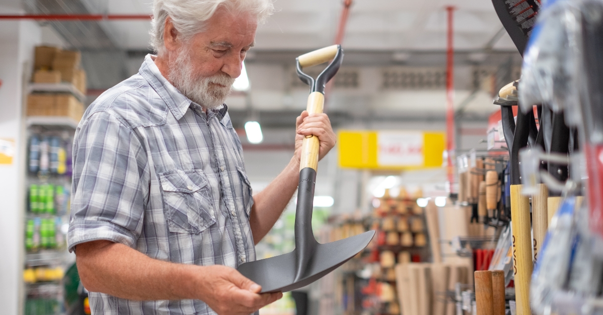 senior man shopping in a hardware store