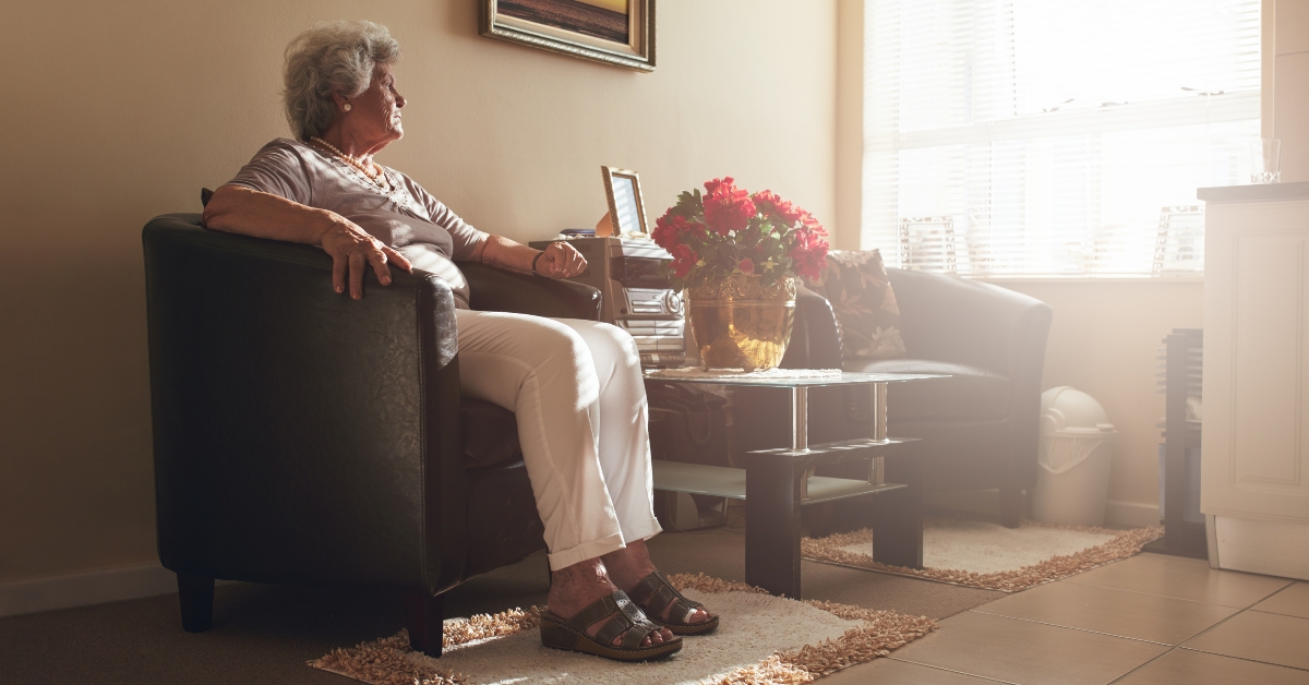 senior woman sitting alone