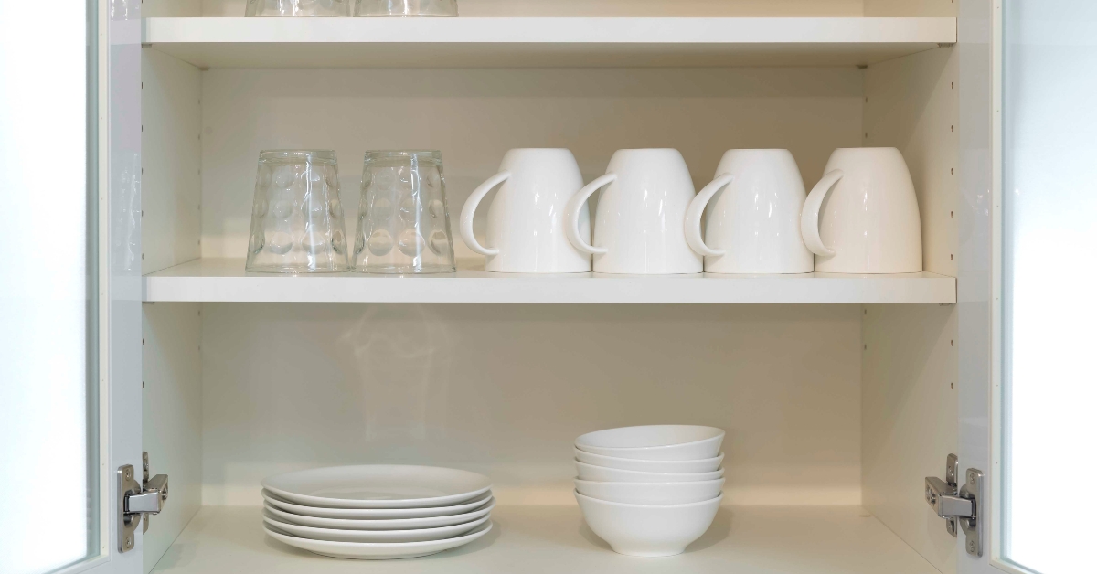 Glass and bowl placed in the kitchen cabinet