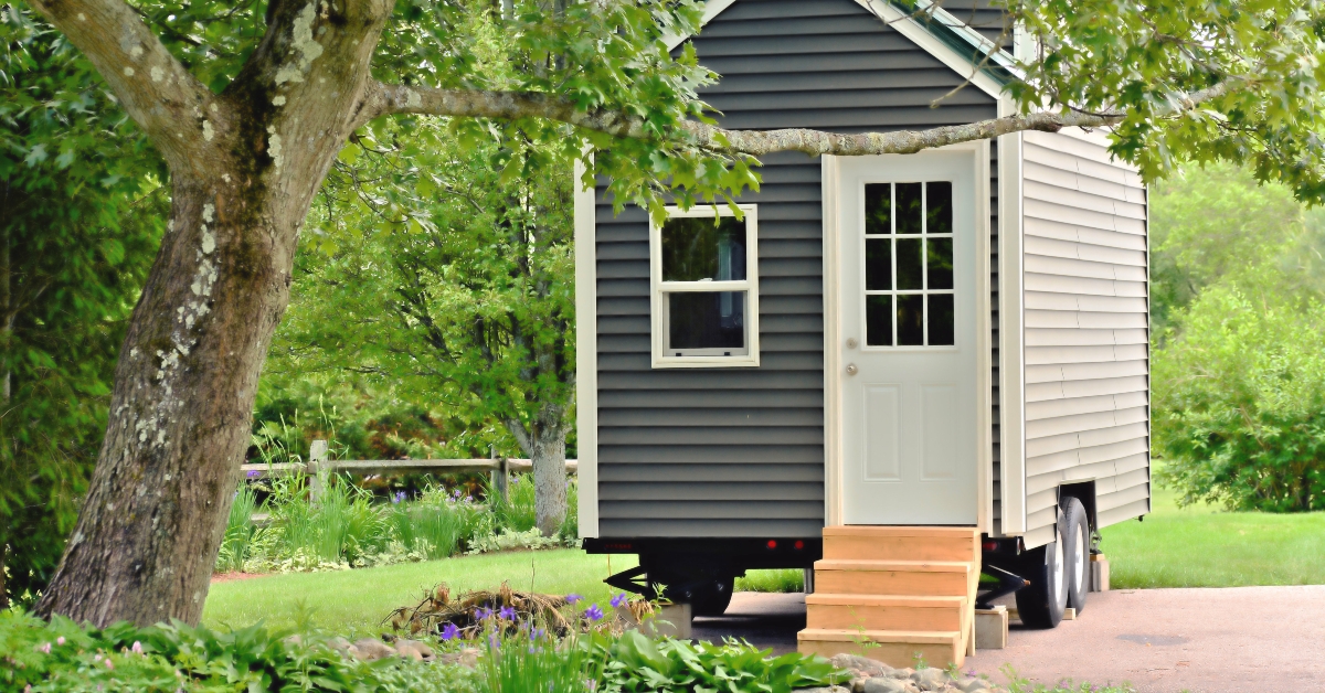 Tiny gray house on wheels