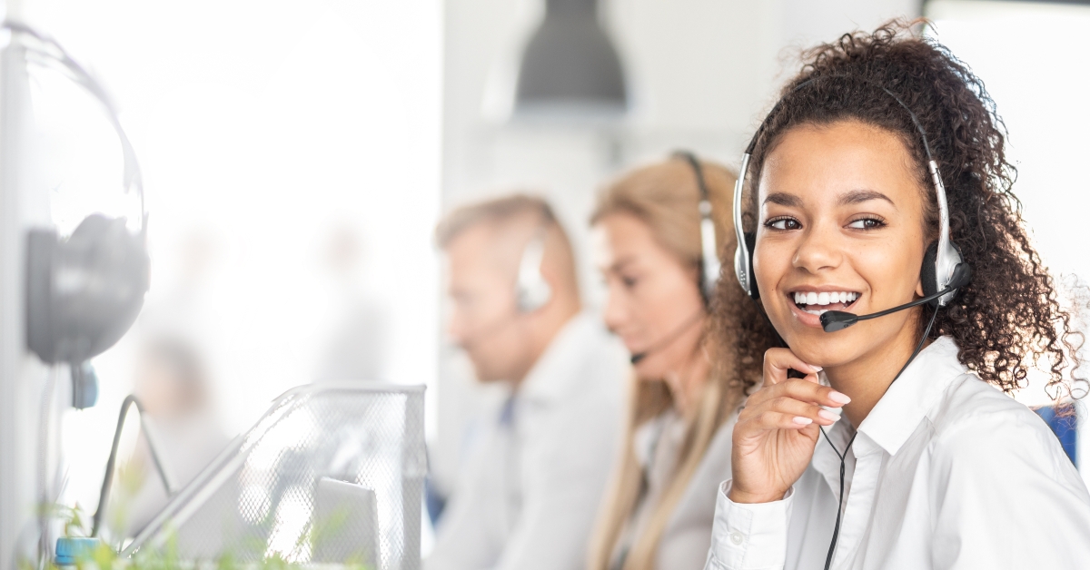 Call center worker accompanied by her team