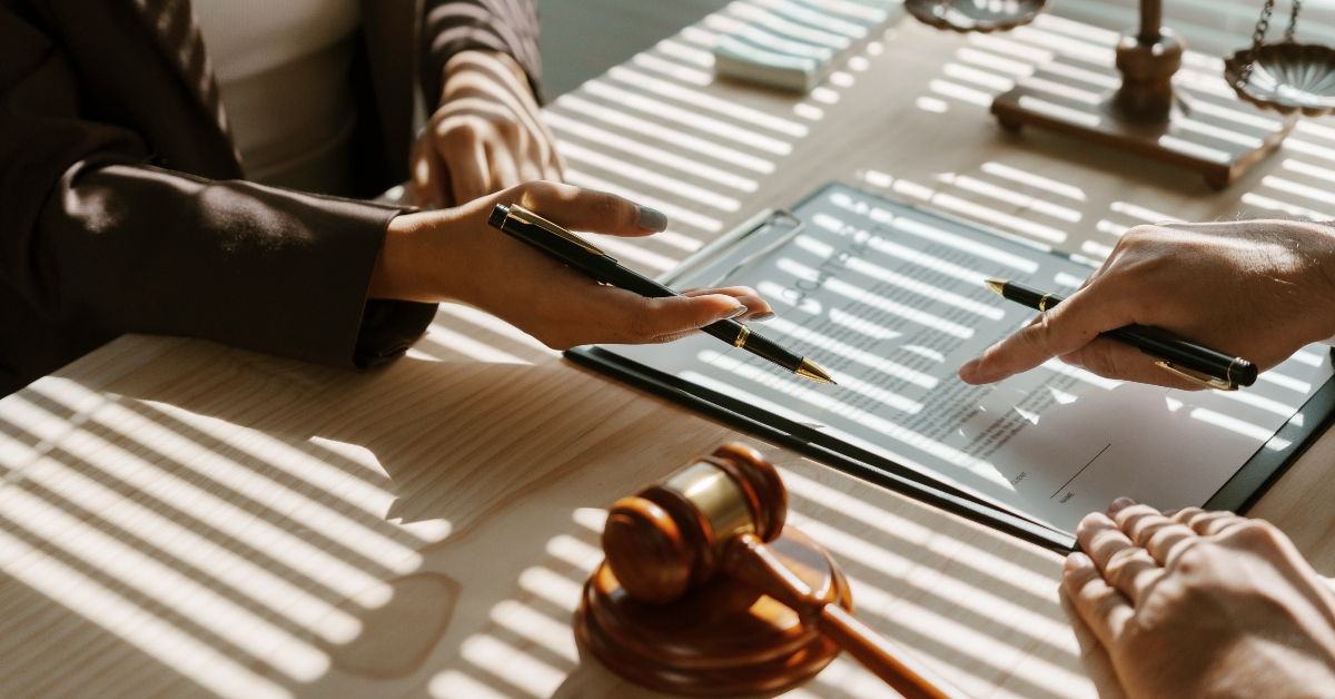 Lawyer is pointing with a pen