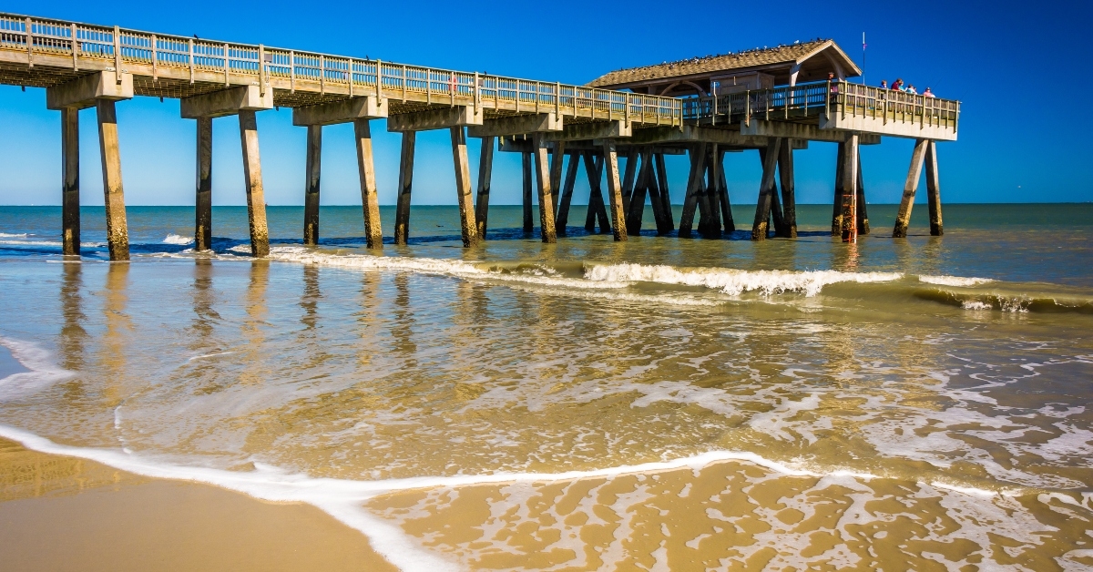 fishing pier and atlantic ocean at tybee island georgia