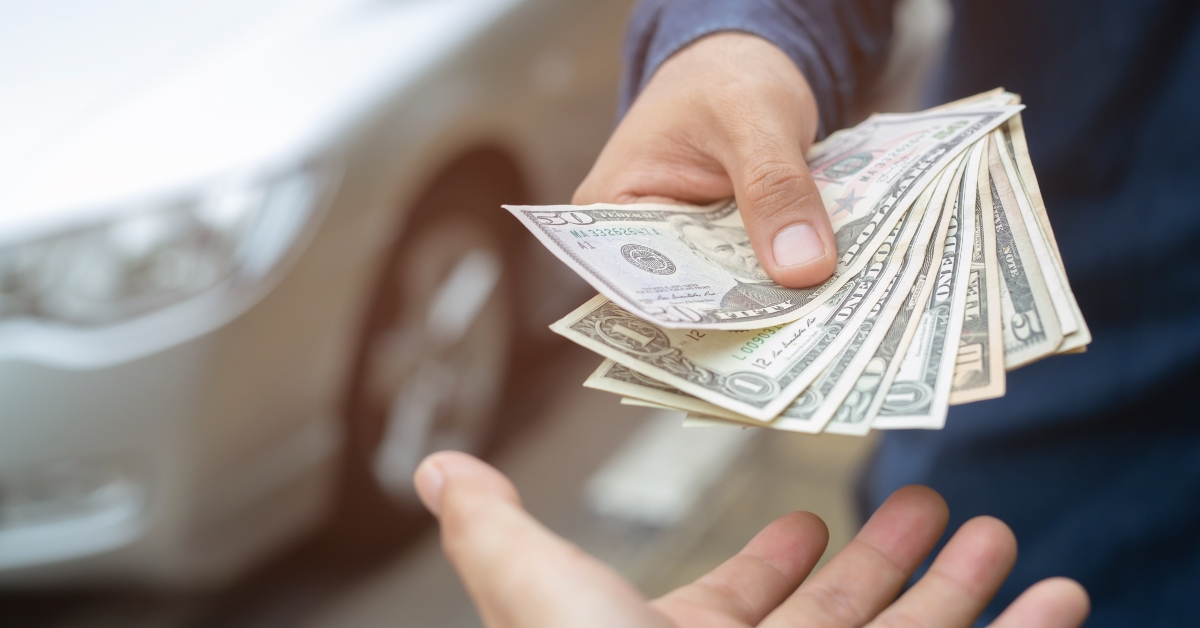 man holding money in hand