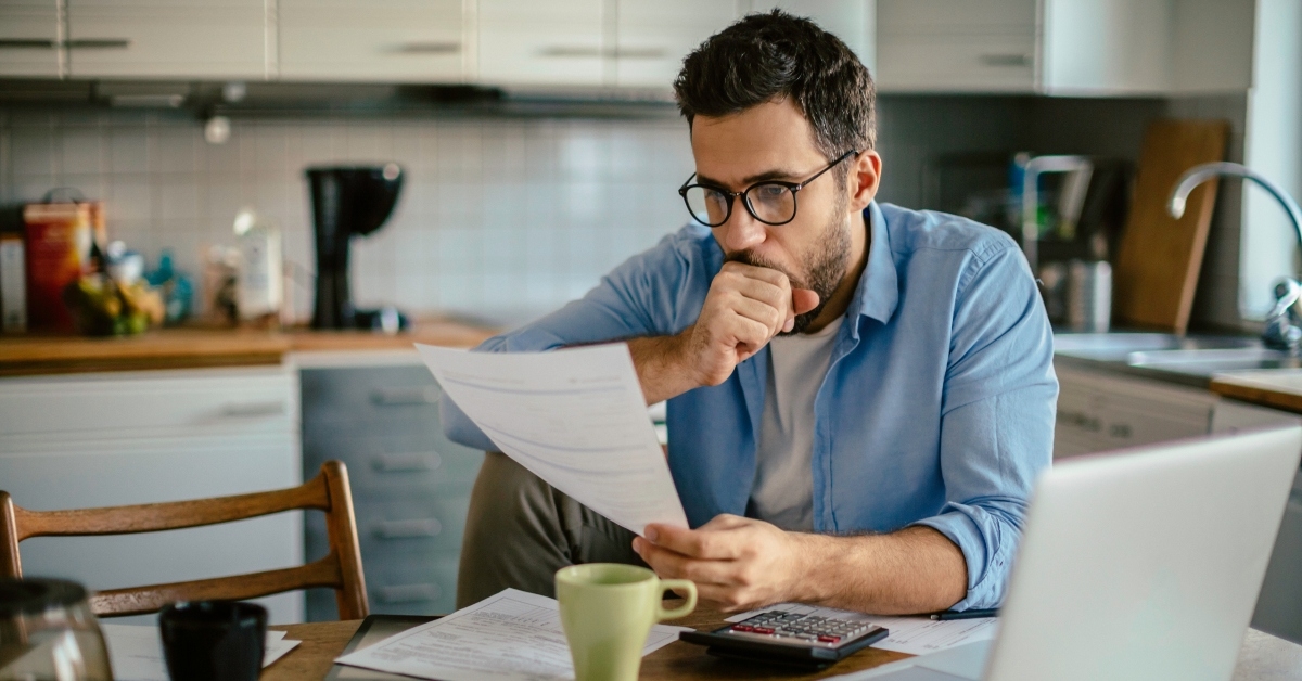 worried man over bills