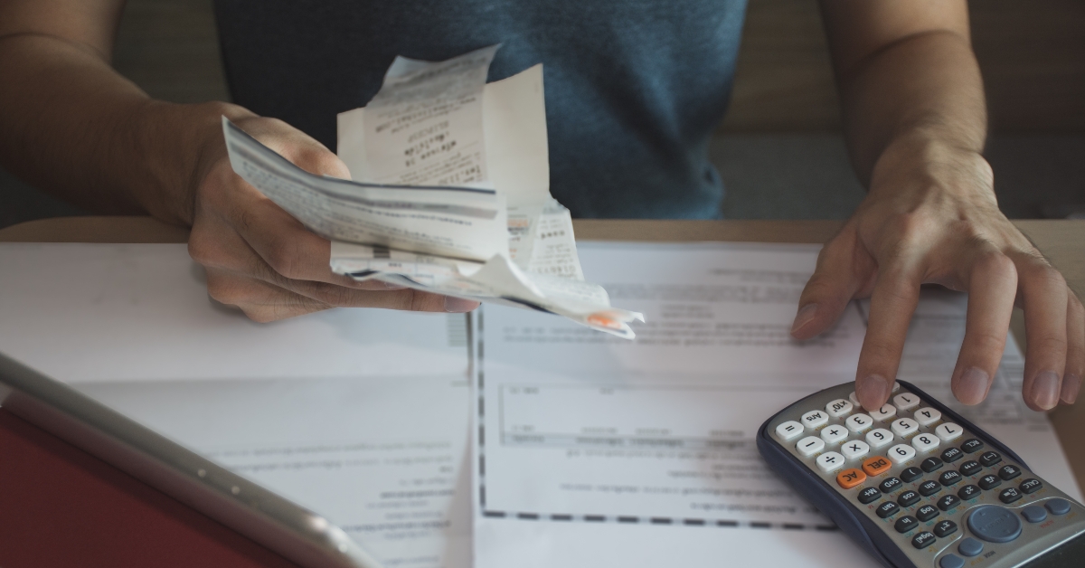 man using calculator