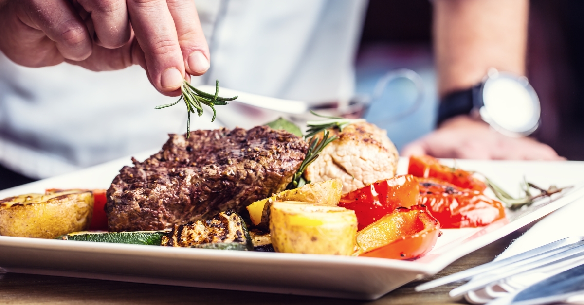 prepared beef steak with vegetable decoration