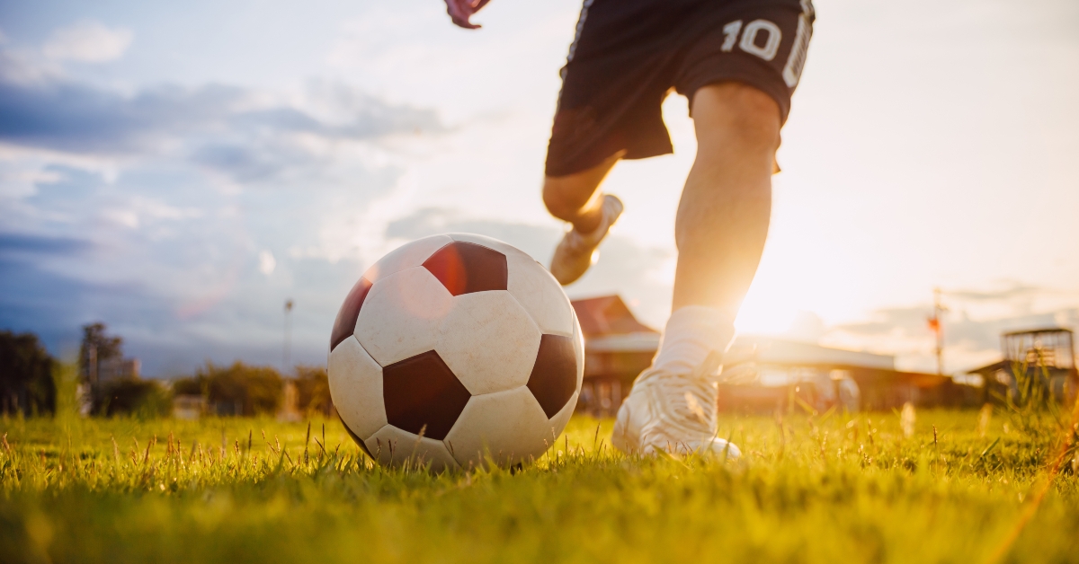 kids playing soccer football for exercise