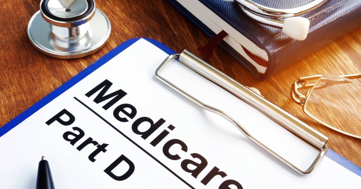 medicare part d documents with clipboard on a desk
