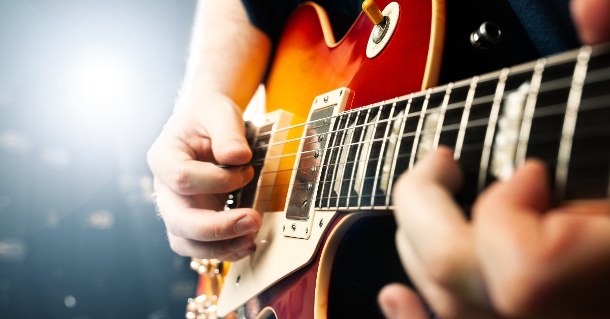 playing a guitar close up