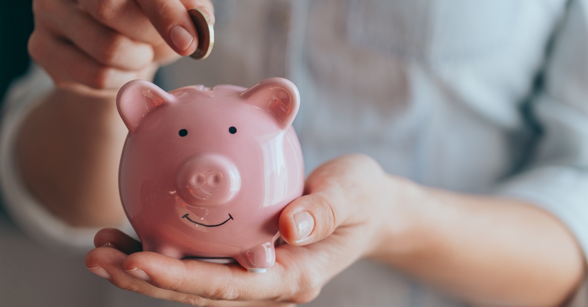 pink piggy bank on hand