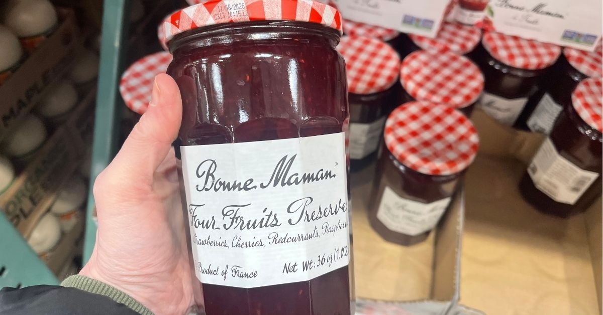 four fruit preserves in a spread